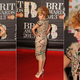 Illustration for article titled Gowns Were Sexy, Chic and Shitshow Shiny at the Brit Awards